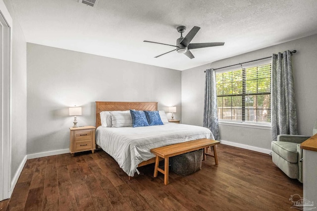 4684 Evelyn St, Pace, FL 32571 - bedroom with baseboards, dark wood finished floors, and ceiling fan