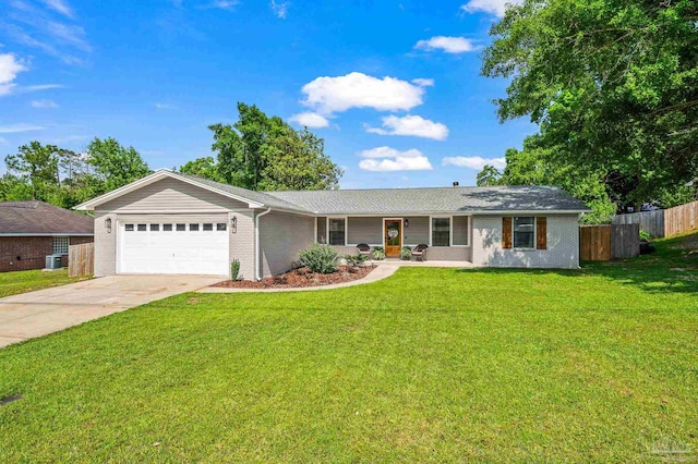 4684 Evelyn St, Pace, FL 32571 - ranch-style home featuring an attached garage, driveway, and brick siding