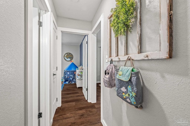 4684 Evelyn St, Pace, FL 32571 - corridor with wood finished floors and a textured wall