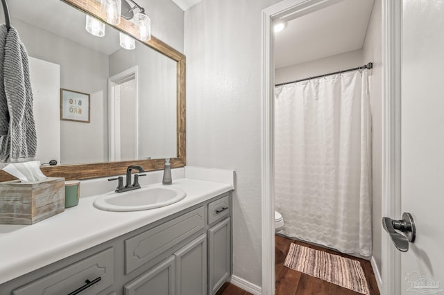 4684 Evelyn St, Pace, FL 32571 - bathroom with wood finished floors, toilet, vanity, and a shower with curtain