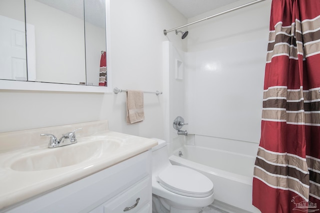 full bathroom featuring a textured ceiling, shower / bath combo, vanity, and toilet