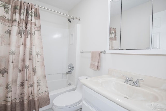 full bathroom featuring vanity, shower / tub combo, and toilet