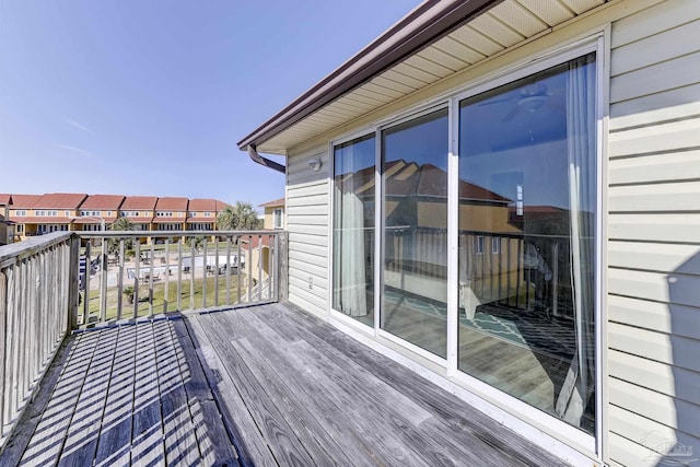 wooden deck with a residential view