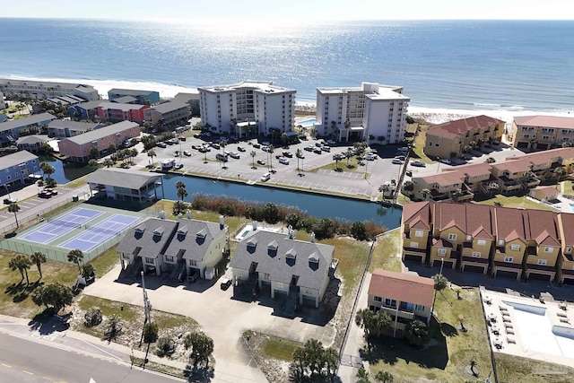 birds eye view of property with a residential view and a water view