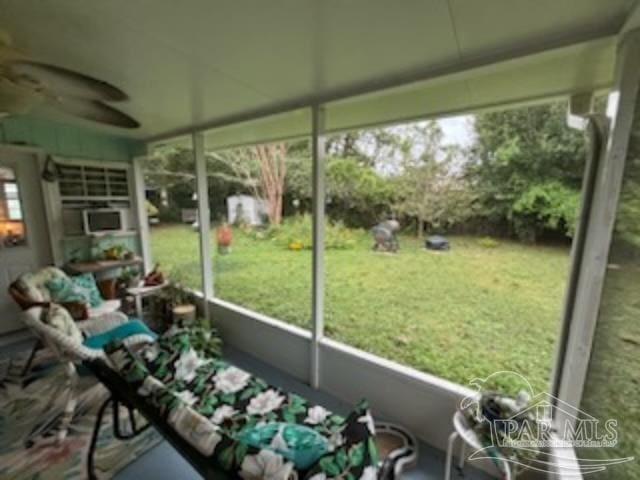 sunroom / solarium with a healthy amount of sunlight