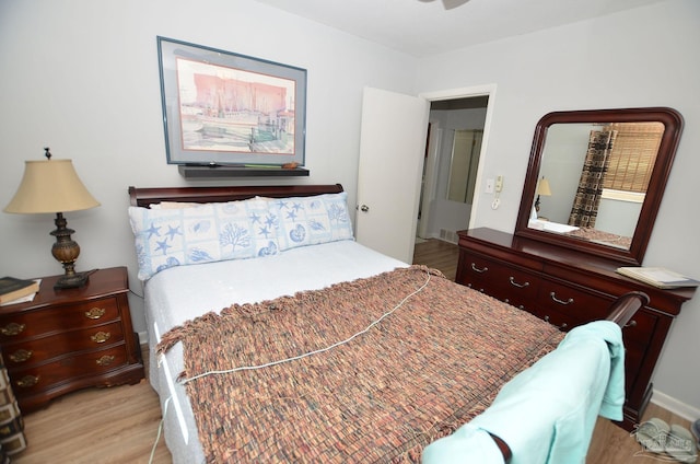 bedroom with light hardwood / wood-style flooring