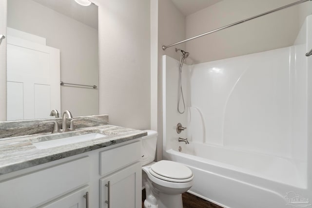 2748 Woodman Loop, Cantonment, FL 32533 - bathroom with vanity, toilet, shower / washtub combination, and wood finished floors