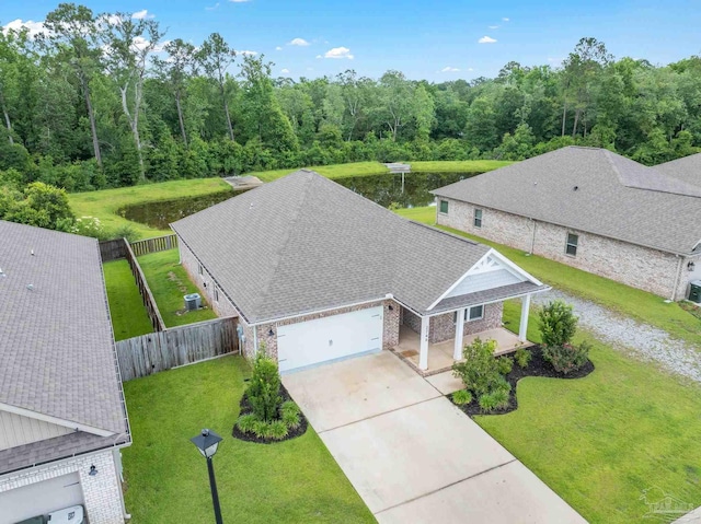 2748 Woodman Loop, Cantonment, FL 32533 - aerial view of property and surrounding area with a heavily wooded area