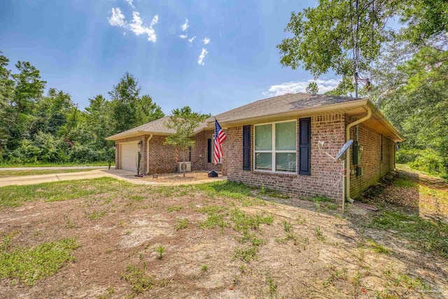 ranch-style house featuring a garage