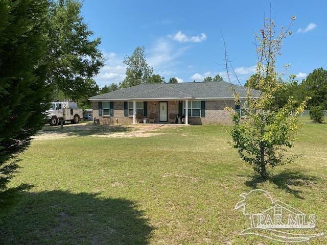 ranch-style home with a front yard