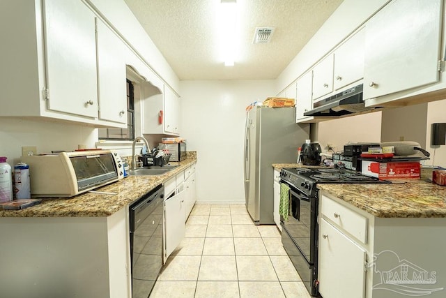 kitchen featuring white cabinets, black appliances, and stone counters