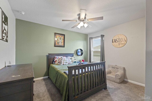 3897 James Stovall St, Pensacola, FL 32526 - bedroom with carpet flooring, baseboards, and a ceiling fan