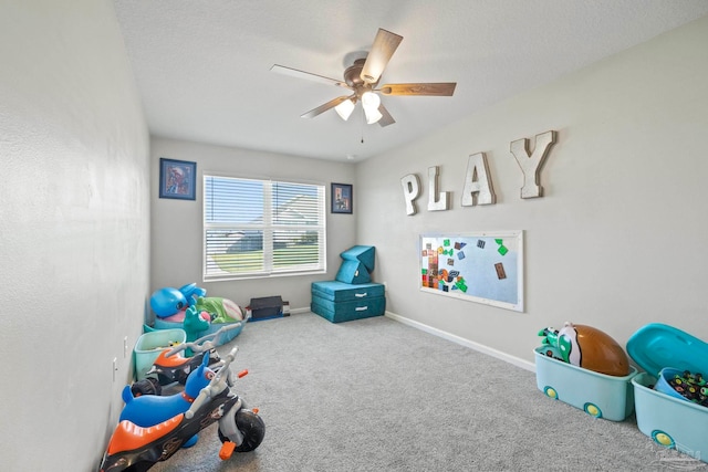 game room featuring ceiling fan and carpet floors