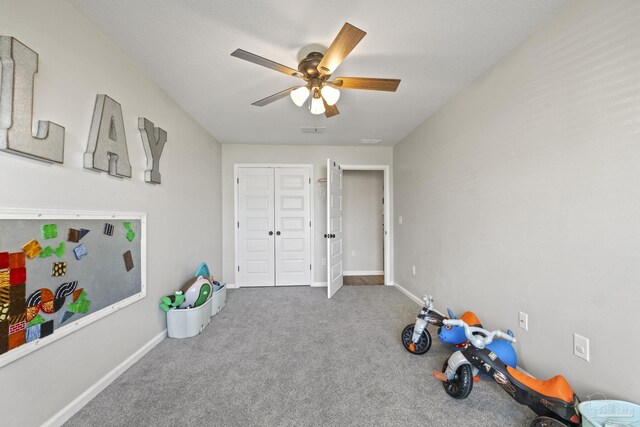 3897 James Stovall St, Pensacola, FL 32526 - recreation room featuring a ceiling fan, carpet flooring, and baseboards