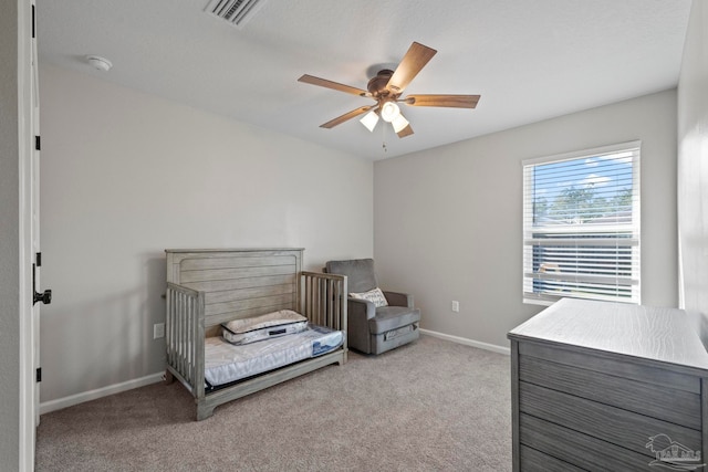 carpeted bedroom featuring ceiling fan