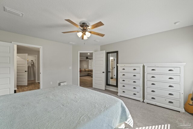 3897 James Stovall St, Pensacola, FL 32526 - bedroom with light colored carpet and ceiling fan