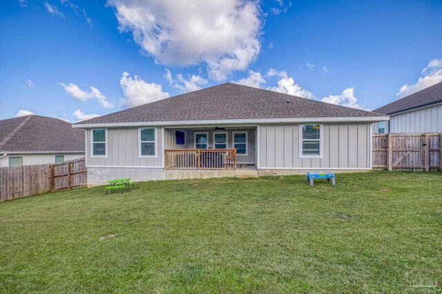3897 James Stovall St, Pensacola, FL 32526 - rear view of house featuring ceiling fan, a shingled roof, and board and batten siding