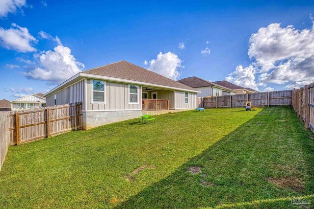 3897 James Stovall St, Pensacola, FL 32526 - rear view of house featuring board and batten siding and a shingled roof