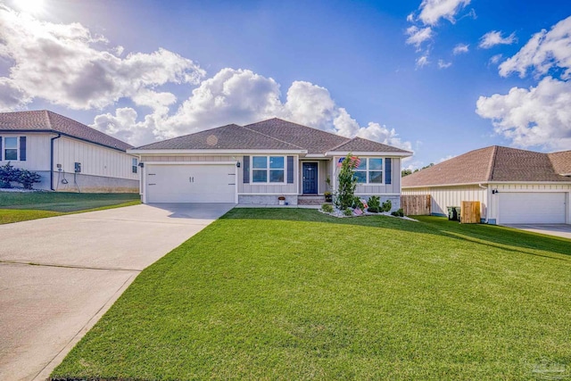 view of front facade featuring a garage and a front lawn