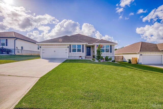 3897 James Stovall St, Pensacola, FL 32526 - ranch-style home featuring driveway, a garage, and roof with shingles