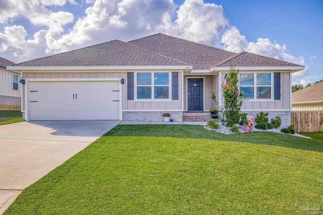 3897 James Stovall St, Pensacola, FL 32526 - ranch-style home with board and batten siding, an attached garage, concrete driveway, and a shingled roof