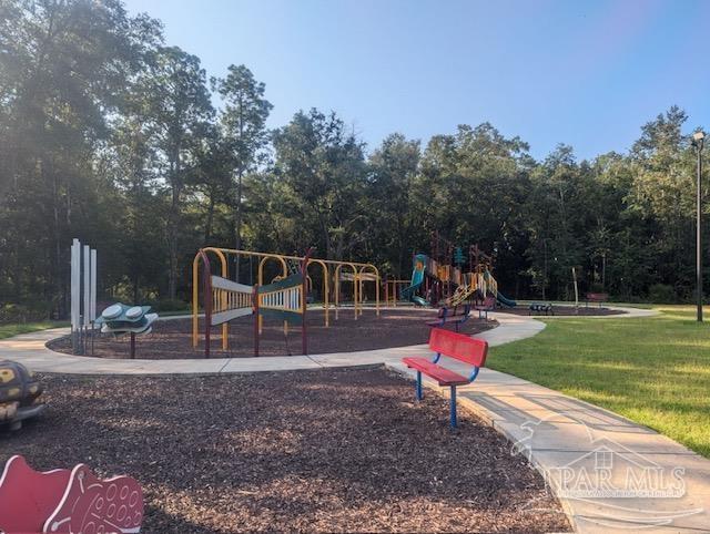 view of playground with a yard