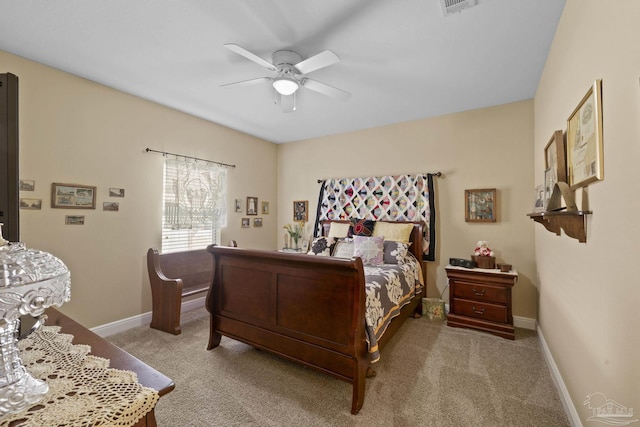 bedroom featuring light carpet and ceiling fan