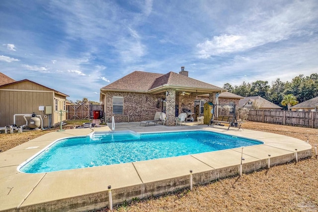 view of pool featuring a patio