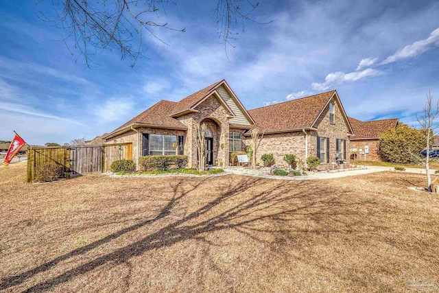 view of front of home with a front lawn