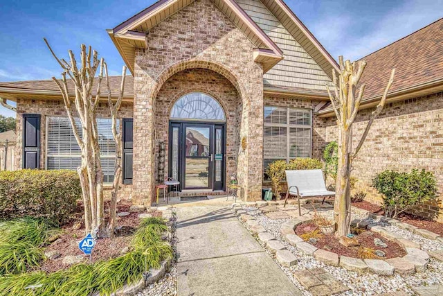 entrance to property with a patio