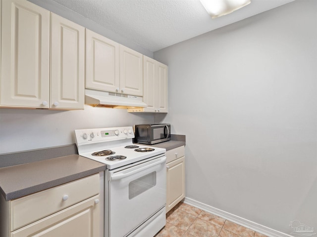 kitchen with baseboards, under cabinet range hood, light tile patterned flooring, white electric stove, and a textured ceiling