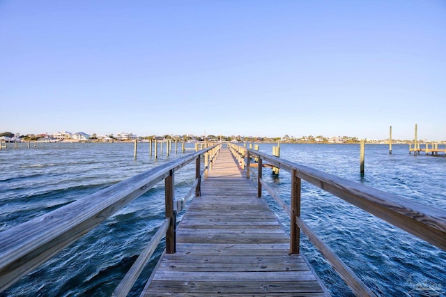 dock area featuring a water view