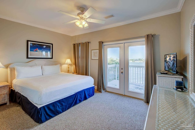 carpeted bedroom with crown molding, access to outside, french doors, and ceiling fan