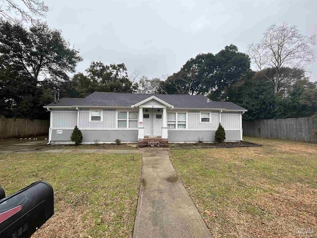 view of front of home with a front yard