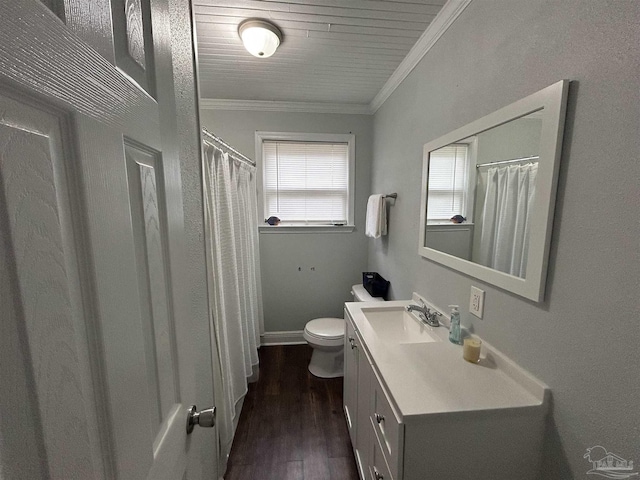 bathroom featuring ornamental molding, wood-type flooring, vanity, and toilet