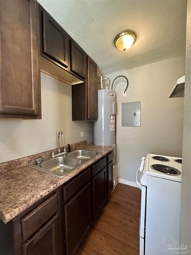 kitchen featuring dark hardwood / wood-style flooring, electric range, a textured ceiling, and sink