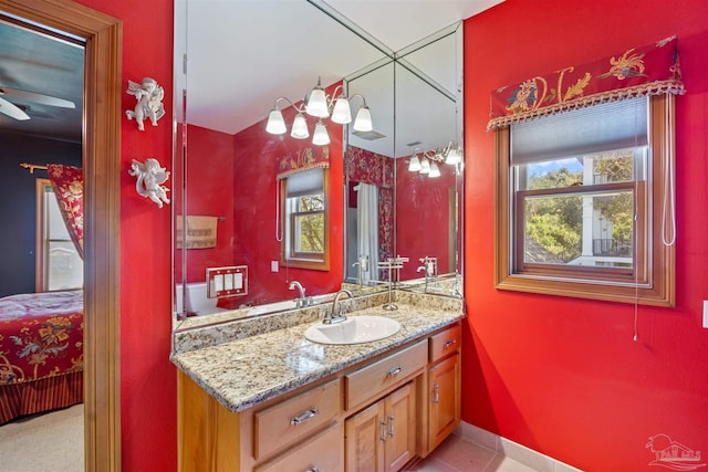 bathroom with vanity and ceiling fan