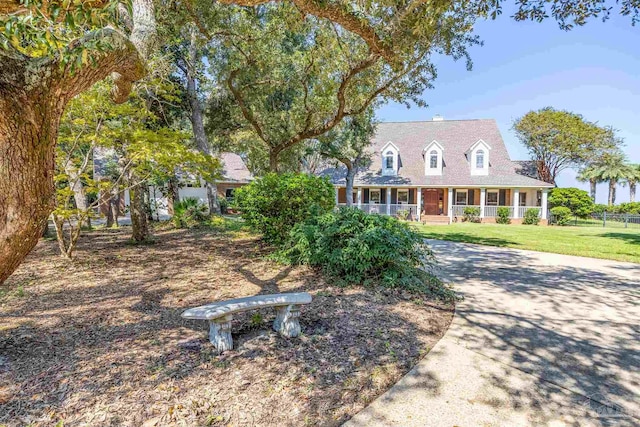 view of front of property featuring covered porch