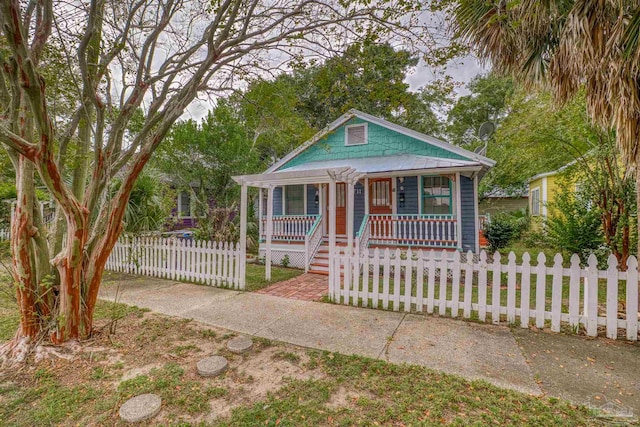 bungalow-style home featuring covered porch