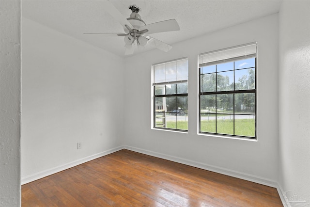 204 Chaseville St, Pensacola, FL 32507 - empty room featuring wood-type flooring, baseboards, and ceiling fan
