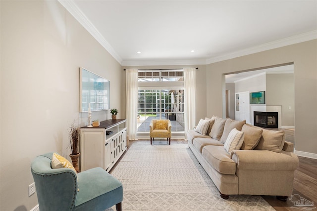4282 Walden Way, Gulf Breeze, FL 32563 - living area featuring baseboards, light wood-style flooring, a fireplace, ornamental molding, and recessed lighting