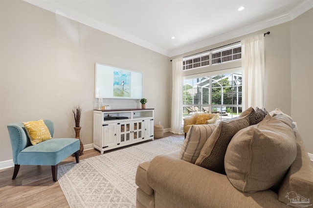 4282 Walden Way, Gulf Breeze, FL 32563 - living room with light wood finished floors, crown molding, baseboards, and recessed lighting