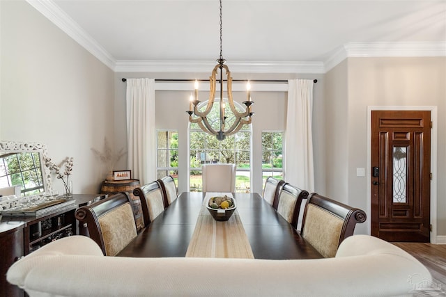 4282 Walden Way, Gulf Breeze, FL 32563 - dining space with a chandelier, ornamental molding, healthy amount of natural light, and wood finished floors