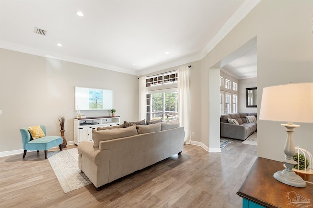 4282 Walden Way, Gulf Breeze, FL 32563 - living area featuring light wood-style floors, ornamental molding, baseboards, and recessed lighting