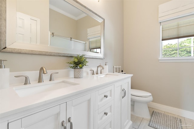 4282 Walden Way, Gulf Breeze, FL 32563 - full bath featuring toilet, crown molding, double vanity, tile patterned flooring, and baseboards