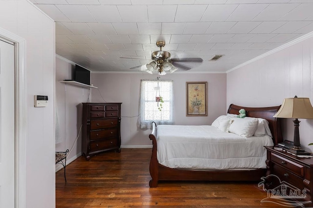 bedroom with dark hardwood / wood-style floors, crown molding, and ceiling fan