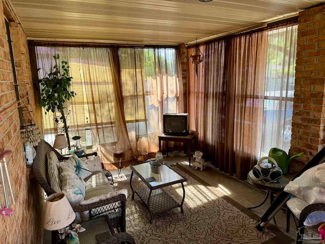 sunroom with wood ceiling