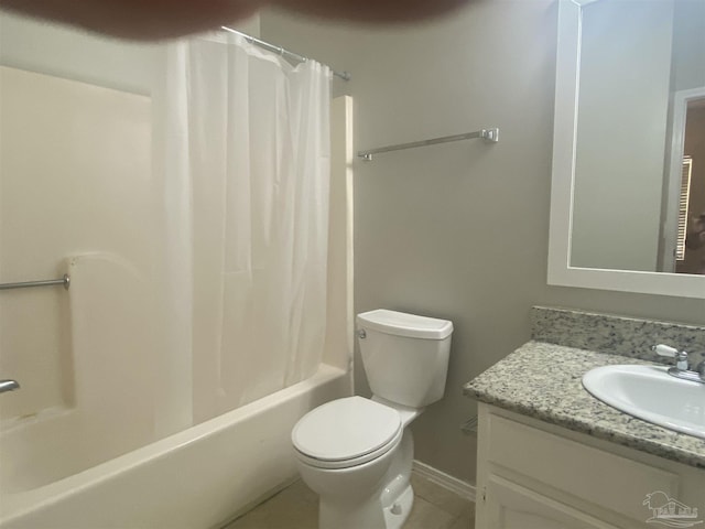 full bathroom with vanity, shower / tub combo, and toilet