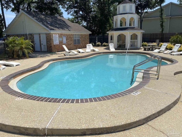 view of pool featuring a patio