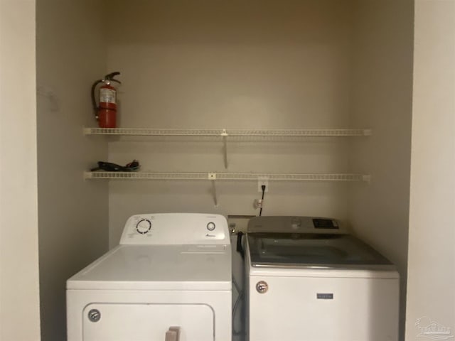 laundry area featuring washing machine and dryer